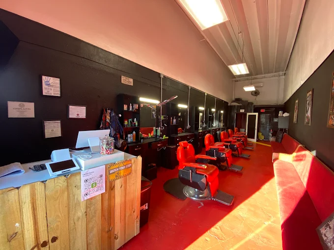 Come Get Faded Barbershop interior, barber chairs and stations
